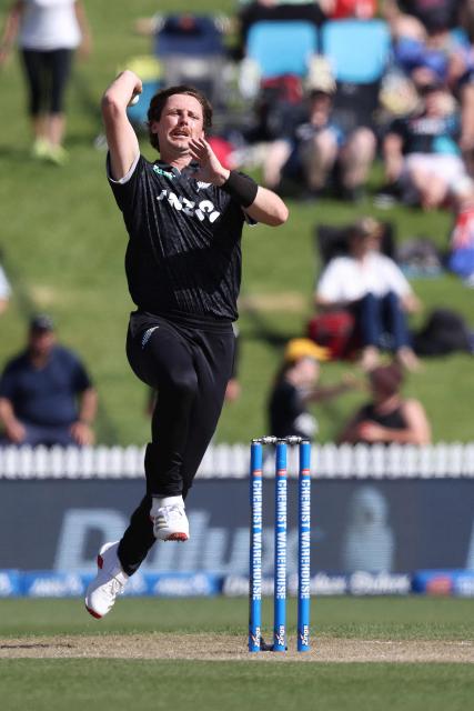New Zealand’s Matt Henry bowls during the third one-day international cricket match between New Zealand and West Indies played at Seddon Park in Hamilton on November 22, 2025. (Photo by Michael Bradley / AFP)