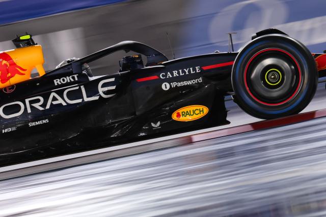 Red Bull Racing's Japanese driver Yuki Tsunoda races during the qualifying session for the Las Vegas Formula One Grand Prix at the Las Vegas Strip Circuit in Las Vegas, Nevada, on November 21, 2025. (Photo by Patrick T. Fallon / AFP)