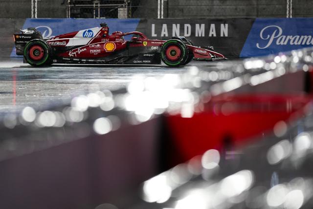 Ferrari's Monegasque driver Charles Leclerc races during the qualifying session for the Las Vegas Formula One Grand Prix at the Las Vegas Strip Circuit in Las Vegas, Nevada, on November 21, 2025. (Photo by Patrick T. Fallon / AFP)
