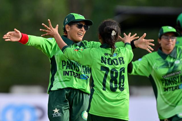 (FILES) Pakistan's Noor Fatima (C) celebrates with teammates after taking the wicket of India's Simu Das during the Women’s Blind Twenty20 World Cup 2025 match between India and Pakistan at the BOI Cricket Stadium in Katunayake on November 16, 2025. On a lush cricket ground outside Colombo the sharp jingling of a ball cuts through the afternoon air. Every rattle is a pushback against the stigma of disability. Sri Lanka and India are co-hosting the first T20 World Cup for visually impaired women. (Photo by Ishara S. KODIKARA / AFP)