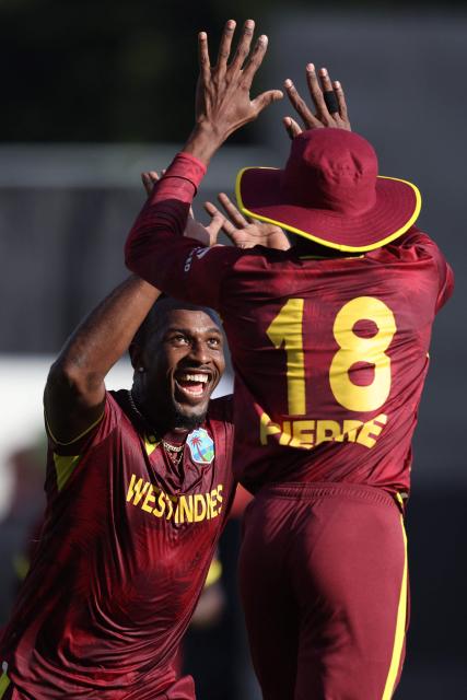 West Indies Matthew Forde celebrates the wicket of New Zealand’s Will Young during the third one-day international cricket match between New Zealand and West Indies played at Seddon Park in Hamilton on November 22, 2025. (Photo by Michael Bradley / AFP)