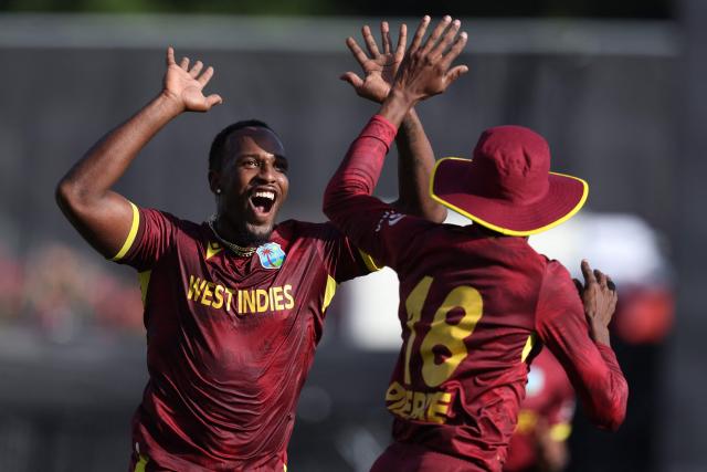 West Indies Matthew Forde celebrates the wicket of New Zealand’s Will Young during the third one-day international cricket match between New Zealand and West Indies played at Seddon Park in Hamilton on November 22, 2025. (Photo by Michael Bradley / AFP)