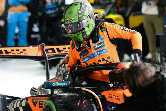 McLaren's British driver Lando Norris exits his car after winning the pole position during the qualifying session for the Las Vegas Formula One Grand Prix at the Las Vegas Strip Circuit in Las Vegas, Nevada, on November 21, 2025. (Photo by Frederic J. Brown / AFP)