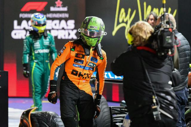 McLaren's British driver Lando Norris exits his car after winning the pole position during the qualifying session for the Las Vegas Formula One Grand Prix at the Las Vegas Strip Circuit in Las Vegas, Nevada, on November 21, 2025. (Photo by Frederic J. Brown / AFP)