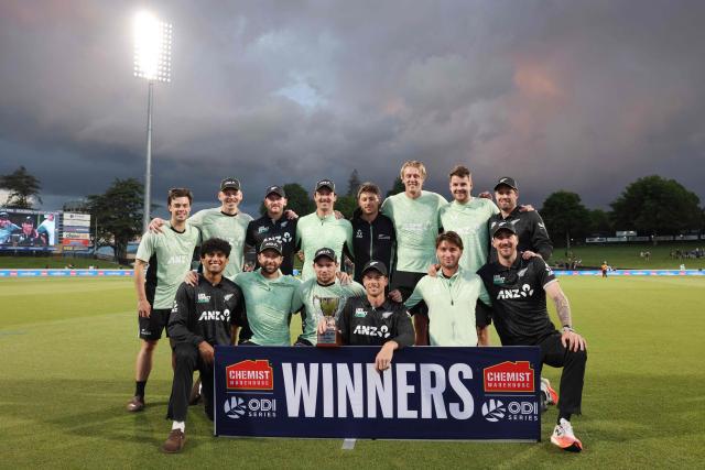 New Zealand players pose after winning the series following the third one-day international cricket match between New Zealand and West Indies played at Seddon Park in Hamilton on November 22, 2025. (Photo by Michael Bradley / AFP)