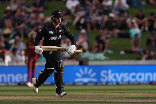 New Zealand’s Mark Chapman makes a run during the third one-day international cricket match between New Zealand and West Indies played at Seddon Park in Hamilton on November 22, 2025. (Photo by Michael Bradley / AFP)