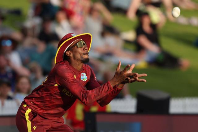 West Indies' Khary Pierre takes the catch to dismiss New Zealand’s Mark Chapman during the third one-day international cricket match between New Zealand and West Indies played at Seddon Park in Hamilton on November 22, 2025. (Photo by Michael Bradley / AFP)