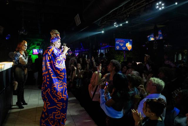 Latrice Royale performs on stage during a G20-themed drag show at the Babylon nightclub in Johannesburg on November 22, 2025, ahead of the opening of the G20 Leader's Summit. (Photo by CAMILLA RICHETTI / AFP)
