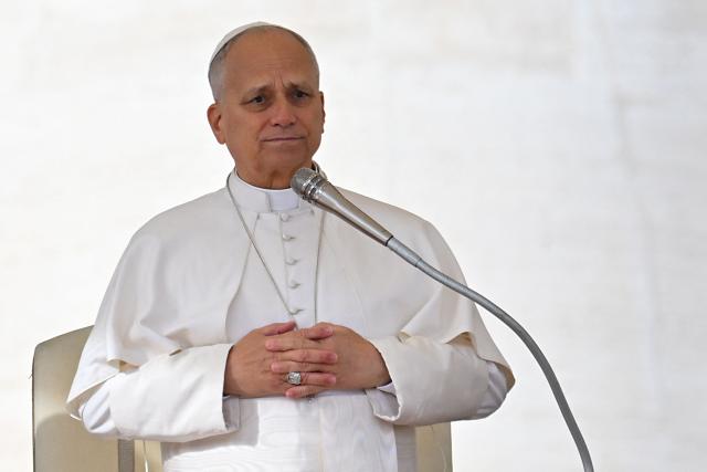 Pope Leo XIV looks on during the audience of Jubilee of Choirs and Choral Society in St. Peter's Square, in the Vatican on November 22, 2025. (Photo by Andreas SOLARO / AFP)