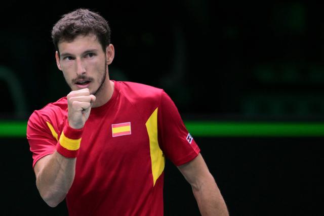 Spain's Pablo Carreno Busta reacts after a point as he plays against Germany's Jan-Lennard Struff during their 2025 Davis Cup semi-final single tennis match at the Super Tennis Arena in Bologna, northen Italy, on November 22, 2025. (Photo by Tiziana FABI / AFP)