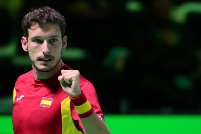 Spain's Pablo Carreno Busta reacts after a point as he plays against Germany's Jan-Lennard Struff during their 2025 Davis Cup semi-final single tennis match at the Super Tennis Arena in Bologna, northen Italy, on November 22, 2025. (Photo by Tiziana FABI / AFP)
