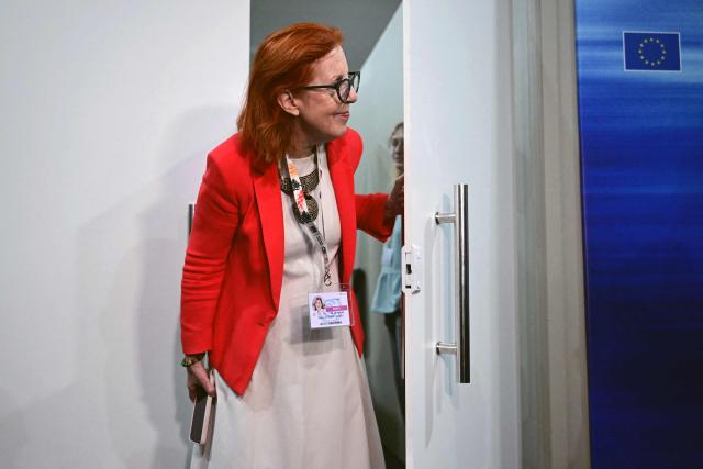 Maria da Graca Carvalho, Portugal's Minister of Environment and Energy, is seen during a break in the meeting at the EU meeting room during the COP30 UN Climate Change Conference in Belem, Para State, Brazil, on November 22, 2025. (Photo by Pablo PORCIUNCULA / AFP)