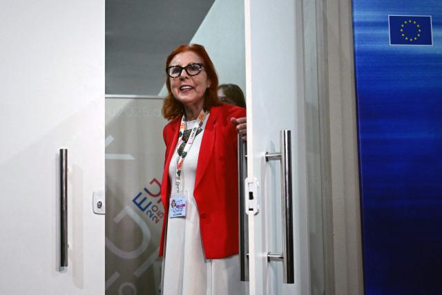 Maria da Graca Carvalho, Portugal's Minister of Environment and Energy, is seen during a break in the meeting at the EU meeting room during the COP30 UN Climate Change Conference in Belem, Para State, Brazil, on November 22, 2025. (Photo by Pablo PORCIUNCULA / AFP)