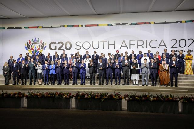 G20 leaders and other government officials pose for a family picture during the G20 Leaders' Summit at the Nasrec Expo Centre in Johannesburg on November 22, 2025. (Photo by GIANLUIGI GUERCIA / POOL / AFP)