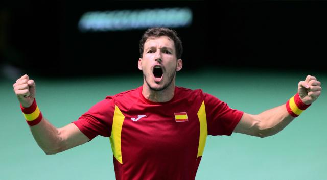 Spain's Pablo Carreno Busta celebrates after winning against Germany's Jan-Lennard Struff after their 2025 Davis Cup semi-final single tennis match at the Super Tennis Arena in Bologna, northen Italy, on November 22, 2025. (Photo by Tiziana FABI / AFP)