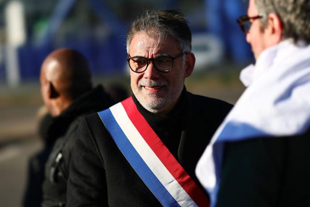 First secretary of French left-wing party Socialist (PS) Olivier Faure arrives to take part in a march in tribute to Mehdi Kessaci, brother of ecologist and anti-drug activist Amine Kessaci, and to protest against drug trafficking, in Marseille, southern France on November 22, 2025. Mehdi Kessaci, the 22-year-old younger brother of Amine Kessaci, who wanted to become a police officer, was shot dead near a concert hall by two people on a motorbike, on November 13. More than a week after this tragedy, Mehdi Kessaci's family is calling for a gathering at the roundabout where he was murdered by two men on a motorbike under the slogan: "Justice for Mehdi, 20, who died for nothing". Other initiatives are planned in some 25 towns and cities. (Photo by Clement MAHOUDEAU / AFP)
