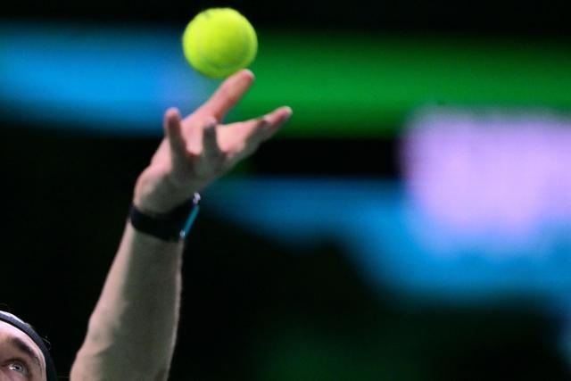 Germany's Alexander Zverev serves to Spain's Jaume Munar during their 2025 Davis Cup semi-final single tennis match at the Super Tennis Arena in Bologna, northen Italy, on November 22, 2025. (Photo by Tiziana FABI / AFP)
