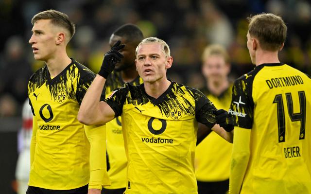 Dortmund's Norwegian defender #26 Julian Ryerson reacts during the German first division Bundesliga football match between Borussia Dortmund and VfB Stuttgart in Dortmund on November 22, 2025. (Photo by INA FASSBENDER / AFP) / DFL REGULATIONS PROHIBIT ANY USE OF PHOTOGRAPHS AS IMAGE SEQUENCES AND/OR QUASI-VIDEO