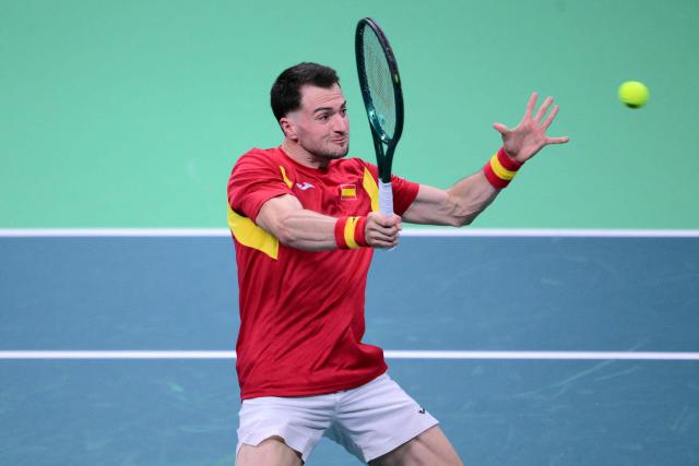 Spain's Marcel Granollers-Pujol returns the ball during his 2025 Davis Cup semi-final doubles tennis match against Germany at the Super Tennis Arena in Bologna, northen Italy, on November 22, 2025. (Photo by Tiziana FABI / AFP)
