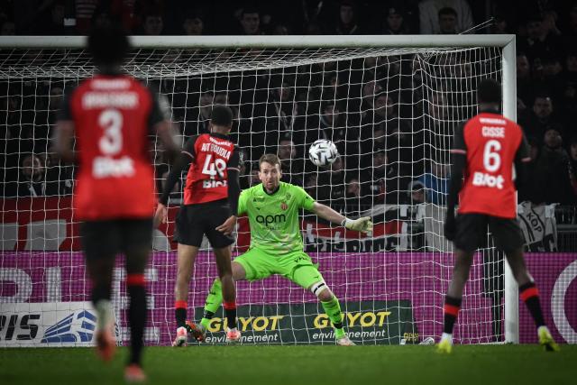 Rennes' Moroccan defender #48 Abdelhamid Ait Boudlal (2nd L) scores the opening goal during the French L1 football match between Stade Rennais FC and AS Monaco at the Roazhon Park stadium in Rennes, western France, on November 22, 2025. (Photo by Lou BENOIST / AFP)