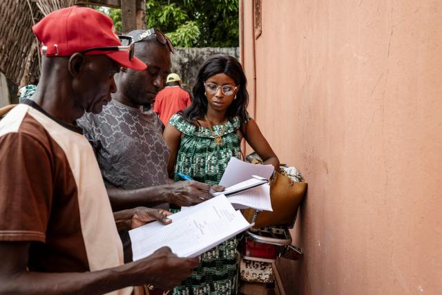 Officials from the National Electoral Commission (CNE) check electoral materials at their regional offices in Gabu, on November 22, 2025, on the eve of Guinea-Bissau’s general elections. Guinea-Bissau votes in general elections on November 23, 2025. (Photo by PATRICK MEINHARDT / AFP)