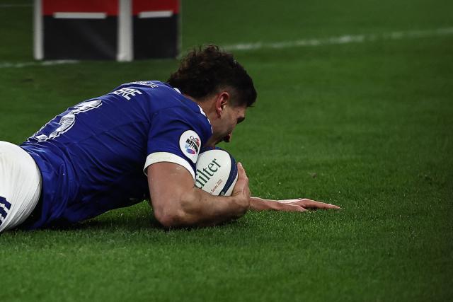 France's centre #13 Nicolas Depoortere scores a try during the Autumn Nations Series international rugby union test match between France and Australia at the Stade de France in Saint-Denis, north of Paris, on November 22, 2025. (Photo by Anne-Christine POUJOULAT / AFP)