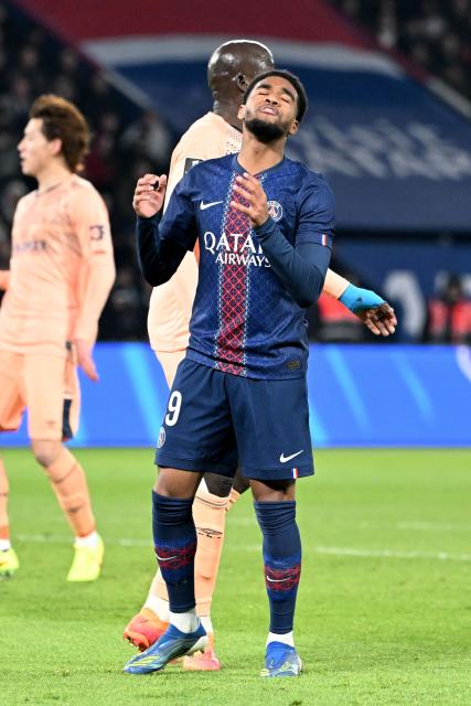 Paris Saint-Germain's French forward #49 Ibrahim Mbaye reacts after missing a goal opportunity during the French L1 football match between Paris Saint-Germain (PSG) and Le Havre AC at the Parc des Princes stadium in Paris, on November 22, 2025. (Photo by Bertrand GUAY / AFP)
