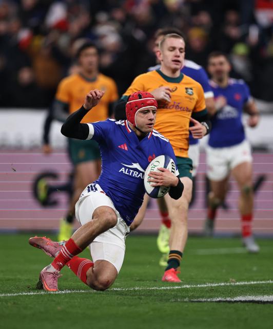 France's wing #11 Louis Bielle-Biarrey  scores a try  during the Autumn Nations Series international rugby union test match between France and Australia at the Stade de France in Saint-Denis, north of Paris, on November 22, 2025. (Photo by Anne-Christine POUJOULAT / AFP)