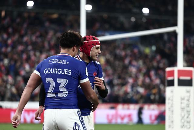France's wing #11 Louis Bielle-Biarrey (R) celebrates with France's centre #23 Kalvin Gourgues after scoring a try  during the Autumn Nations Series international rugby union test match between France and Australia at the Stade de France in Saint-Denis, north of Paris, on November 22, 2025. (Photo by Thibaud MORITZ / AFP)
