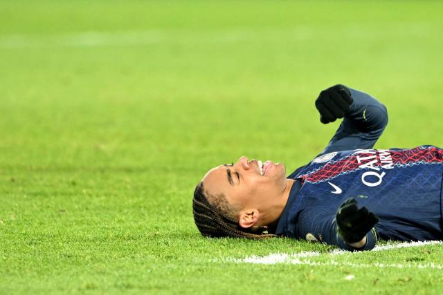 Paris Saint-Germain's French forward #29 Bradley Barcola celebrates after scoring a goal during the French L1 football match between Paris Saint-Germain (PSG) and Le Havre AC at the Parc des Princes stadium in Paris, on November 22, 2025. (Photo by Bertrand GUAY / AFP)