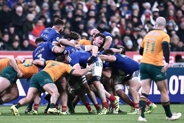 France's and Australia's players vie in a maul  during the Autumn Nations Series international rugby union test match between France and Australia at the Stade de France in Saint-Denis, north of Paris, on November 22, 2025. (Photo by Thibaud MORITZ / AFP)