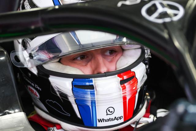 French driver Doriane Pin sits in her car before the start of the F1 Academy race at the Las Vega Strip Circuit in Las Vegas, Nevada, on November 22, 2025. (Photo by Patrick T. Fallon / AFP)