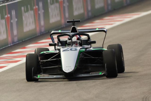 French driver Doriane Pin races during the F1 Academy race at the Las Vegas Strip Circuit in Las Vegas, Nevada, on November 22, 2025. (Photo by Patrick T. Fallon / AFP)