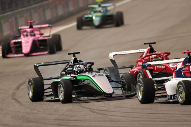 French driver Doriane Pin (L) races during the F1 Academy race at the Las Vegas Strip Circuit in Las Vegas, Nevada, on November 22, 2025. (Photo by Patrick T. Fallon / AFP)