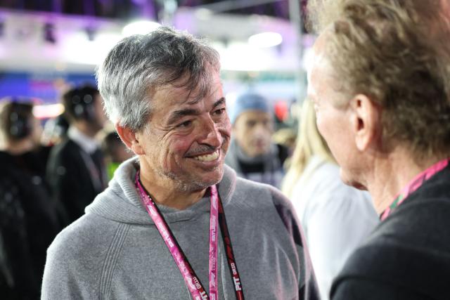 Apple executive Eddy Cue attends the grid tour before the start of the Las Vegas Formula One Grand Prix at the Las Vegas Strip Circuit in Las Vegas, Nevada, on November 22, 2025. (Photo by Patrick T. Fallon / AFP)