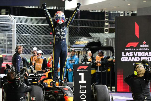 TOPSHOT - Red Bull Racing's Dutch driver Max Verstappen celebrates after winning the Las Vegas Formula One Grand Prix at the Las Vegas Strip Circuit in Las Vegas, Nevada, on November 22, 2025. (Photo by Frederic J. Brown / AFP)