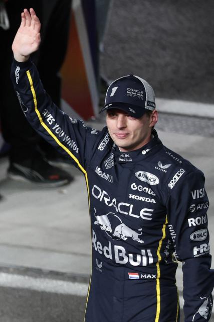 Red Bull Racing's Dutch driver Max Verstappen waves after winning the Las Vegas Formula One Grand Prix at the Las Vegas Strip Circuit in Las Vegas, Nevada, on November 22, 2025. (Photo by Patrick T. Fallon / AFP)
