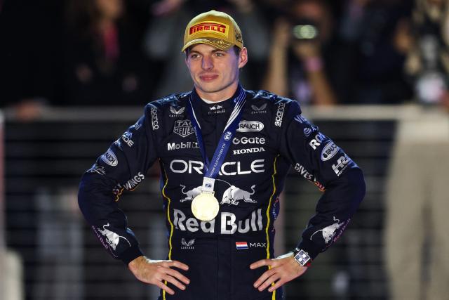Race winner Red Bull Racing's Dutch driver Max Verstappen stands on the podium after the Las Vegas Formula One Grand Prix at the Las Vegas Strip Circuit in Las Vegas, Nevada, on November 22, 2025. (Photo by Patrick T. Fallon / AFP)