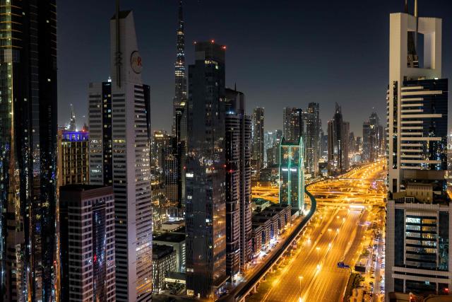 The empty Sheikh Zayed Road is made ready for the early morning start of the "Dubai Run 2025" as part of the 9th Edition of Dubai Fitness Challenge, in Dubai on November 23, 2025. (Photo by FADEL SENNA / AFP)