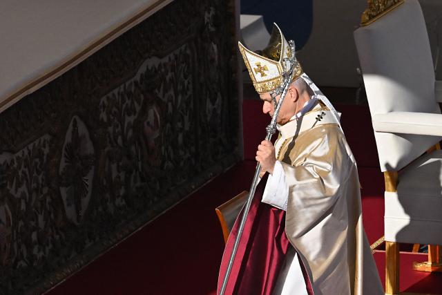 Pope Leo XIV leaves at the end of the mass of Jubilee of Choirs and Choral Society at St Peter's Square in The Vatican on November 23, 2025. (Photo by Andreas SOLARO / AFP)