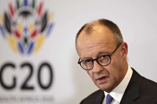 German Chancellor Friedrich Merz gives a press conference on the sidelines of a G20 Leaders' Summit plenary session at the Nasrec Expo Centre in Johannesburg on November 23, 2025. (Photo by EMMANUEL CROSET / AFP)