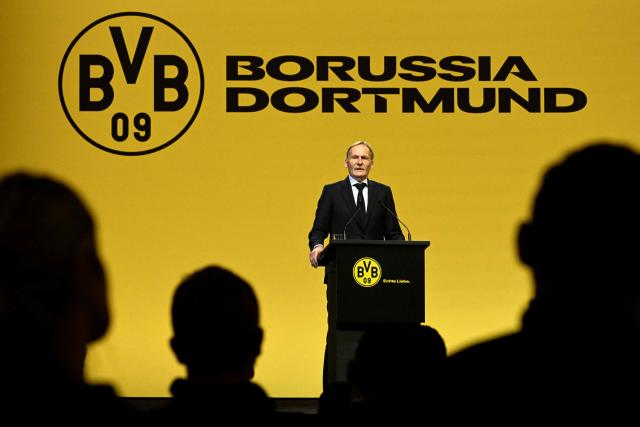 Borussia Dortmund's CEO Hans-Joachim Watzke delivers a speech during the German first division Bundesliga football club's annual general meeting in Dortmund, western Germany on November 23, 2025. After 20 years as managing director, Watzke aims to be elected as president of the club to replace current president Reinhold Lunow. (Photo by Ina FASSBENDER / AFP)