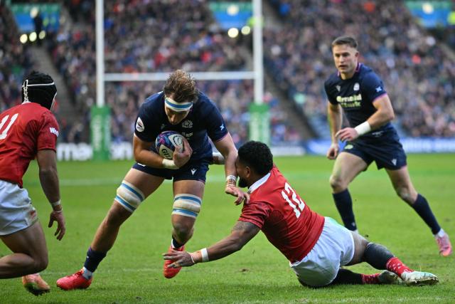 Scotland's flanker Jamie Ritchie dives for the line to score their first try during the Autumn Nations Series international rugby union match between Scotland and Tonga at Murrayfield in Edinburgh on November 23, 2025. (Photo by ANDY BUCHANAN / AFP)