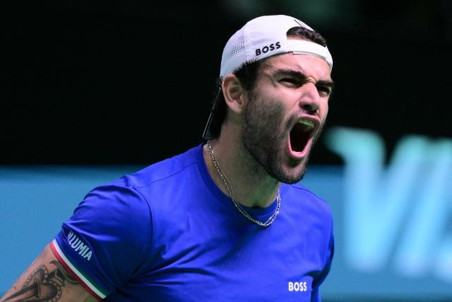 Italy's Matteo Berrettini reacts as he plays against Spain's Pablo Carreno Busta during their 2025 Davis Cup men's single final tennis match at the Super Tennis Arena in Bologna, northen Italy, on November 23, 2025. (Photo by Tiziana FABI / AFP)