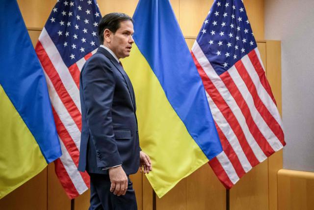 US Secretary of State Marco Rubio arrives to hold a press conference following the closed-door talks, with the Ukrainian delegation, on a US plan to end the war in Ukraine at the US Mission in Geneva, on November 23, 2025. US Secretary of State Marco Rubio arrived in Geneva on November 23, 2025 morning for discussions on a US plan to end the Ukraine war, after Washington signalled room for negotiation on the controversial proposal. Ukrainian, European and Canadian officials were also gathering in the Swiss city. (Photo by Fabrice COFFRINI / AFP)