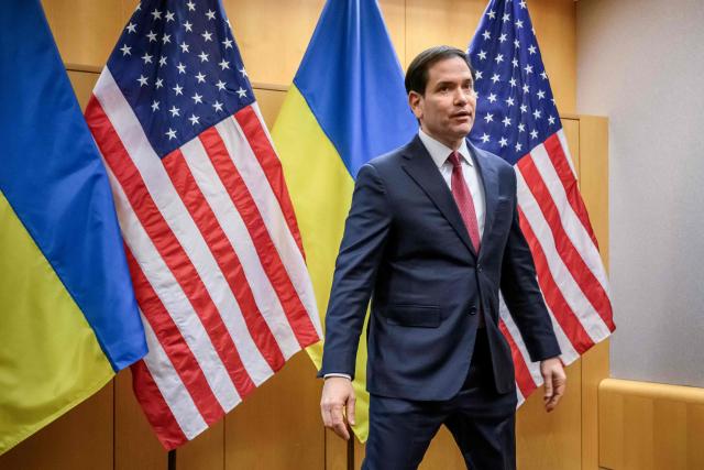 US Secretary of State Marco Rubio arrives to hold a press conference following the closed-door talks, with the Ukrainian delegation, on a US plan to end the war in Ukraine at the US Mission in Geneva, on November 23, 2025. US Secretary of State Marco Rubio arrived in Geneva on November 23, 2025 morning for discussions on a US plan to end the Ukraine war, after Washington signalled room for negotiation on the controversial proposal. Ukrainian, European and Canadian officials were also gathering in the Swiss city. (Photo by Fabrice COFFRINI / AFP)