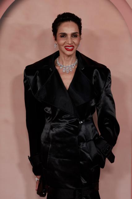 French model Farida Khelfa attends the Franca Fund Gala 2025 at the Museum of Islamic Art in Doha, Qatar on November 23, 2025. (Photo by Karim JAAFAR / AFP)