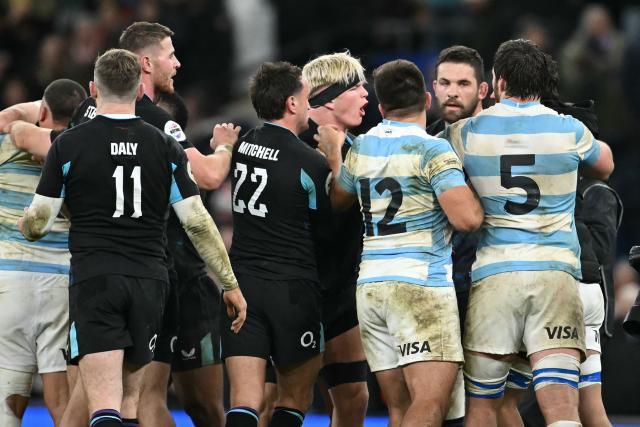 Players clash on the final whistle of the Autumn Nations Series international rugby union match between England and Argentina at Allianz Stadium, Twickenham, in south-west London, on November 23, 2025. England won the game 27-23. (Photo by JUSTIN TALLIS / AFP)
