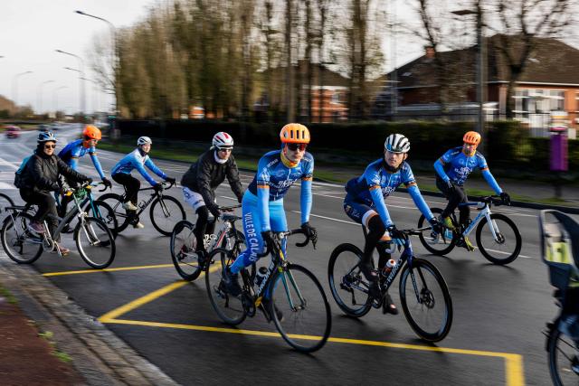 People take part in a commemorative cycling ride to pay tribute to Cindy Morvan, a 39-years-old ambassador for women's cycling who was shot dead by her ex-partner's girlfriend on October 31, 2025, in Calais, northern France, on November 11, 2025. (Photo by Sameer Al-DOUMY / AFP)