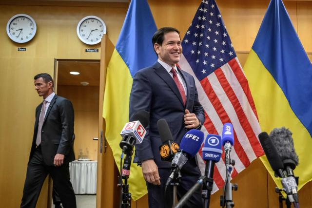 US Secretary of State Marco Rubio arrives to hold a press conference following a closed-door talks on a US plan to end the war in Ukraine at the US Mission in Geneva, on November 23, 2025. US Secretary of State Marco Rubio arrived in Geneva on November 23, 2025 morning for discussions on a US plan to end the Ukraine war, after Washington signalled room for negotiation on the controversial proposal. Ukrainian, European and Canadian officials were also gathering in the Swiss city. (Photo by Fabrice COFFRINI / AFP)